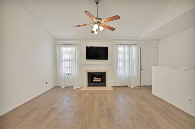 dining space with ceiling fan and light hardwood / wood-style flooring