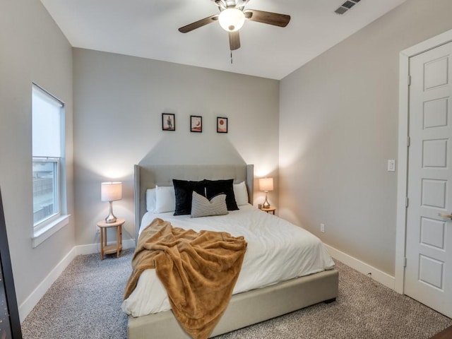 carpeted bedroom featuring ceiling fan