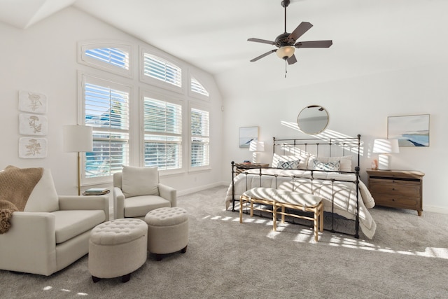 carpeted bedroom featuring ceiling fan and lofted ceiling