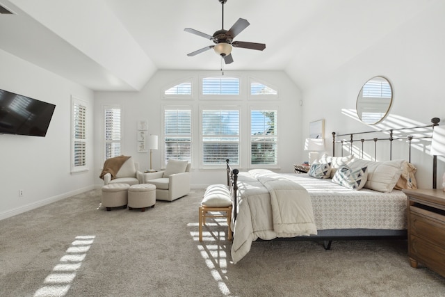 carpeted bedroom featuring lofted ceiling and ceiling fan