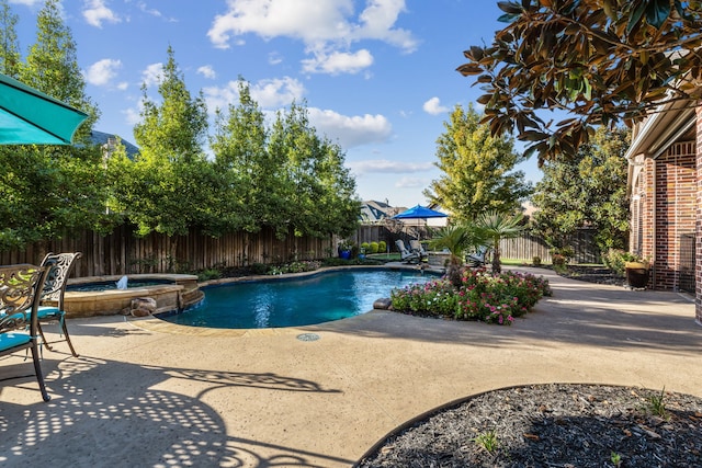 view of pool featuring an in ground hot tub and a patio