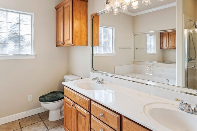 bathroom featuring vanity, toilet, walk in shower, and tile patterned flooring