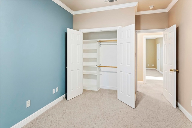 unfurnished bedroom featuring a closet and ornamental molding