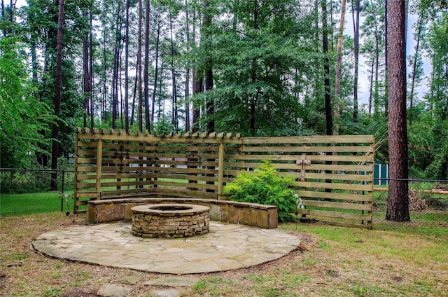 view of patio / terrace with a fire pit