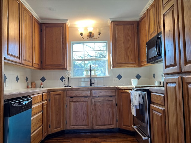 kitchen with stainless steel electric stove, dishwasher, decorative backsplash, sink, and dark hardwood / wood-style floors