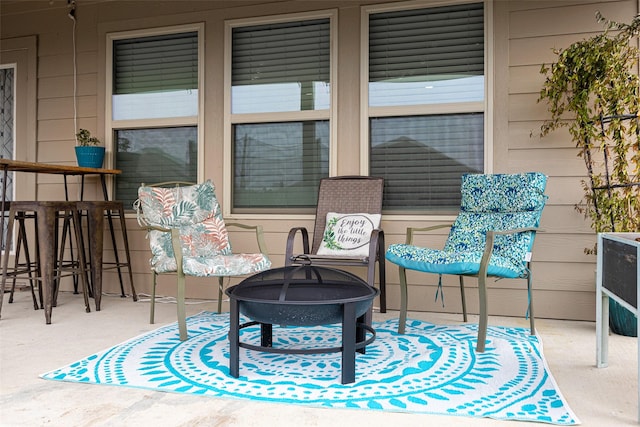 view of patio / terrace with a fire pit