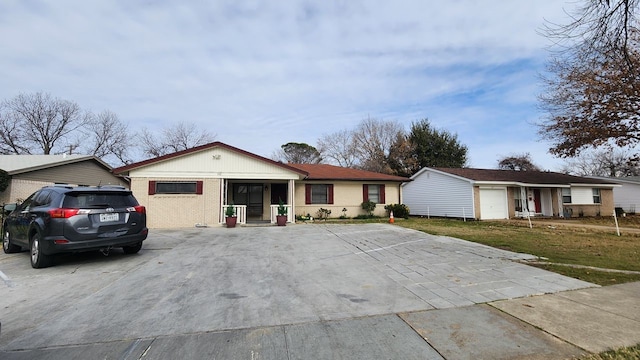 ranch-style house featuring a garage