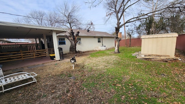 view of yard with a storage unit