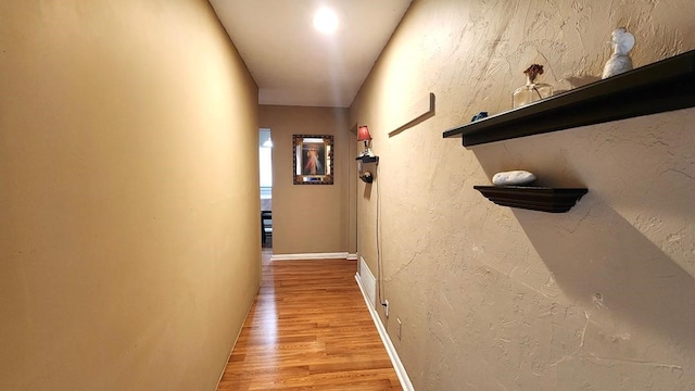 hallway featuring light wood-type flooring