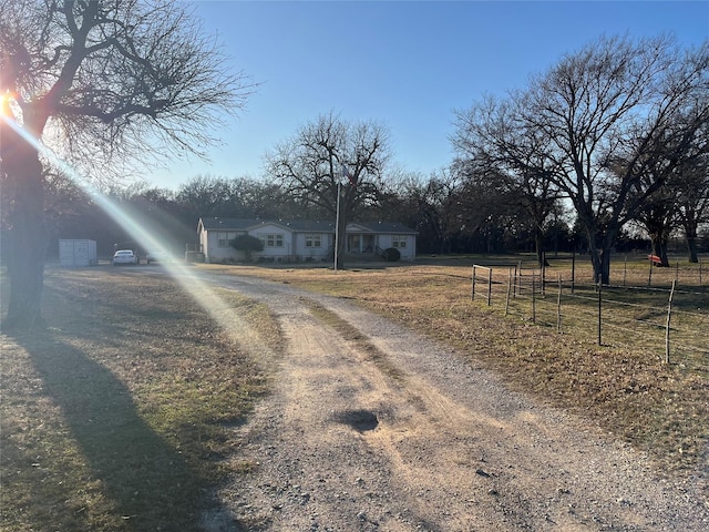 view of street featuring a rural view