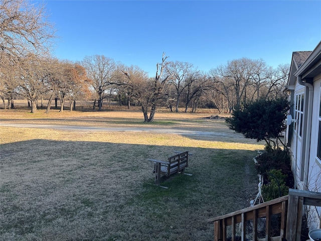 view of yard with a rural view