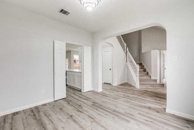 empty room featuring light hardwood / wood-style floors