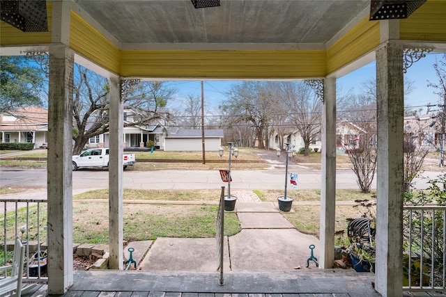 view of yard featuring covered porch