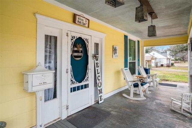 property entrance featuring covered porch