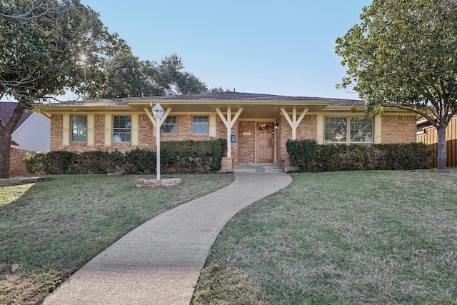 ranch-style house with a front lawn