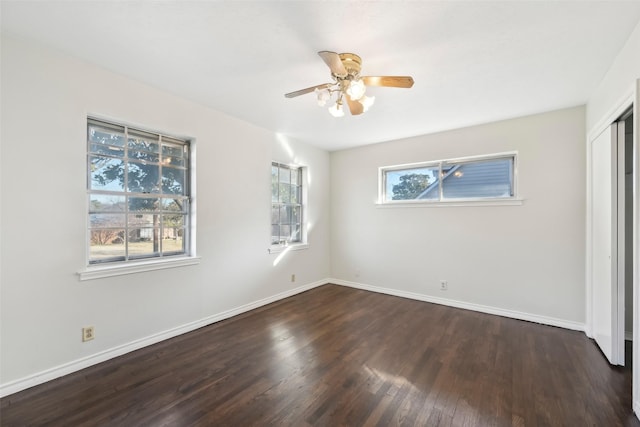 unfurnished bedroom featuring a closet, ceiling fan, and dark wood-type flooring