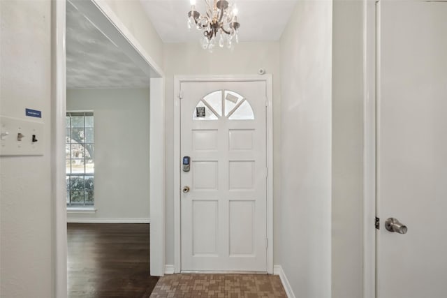 entrance foyer featuring dark hardwood / wood-style flooring