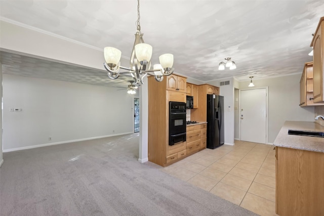 kitchen with black appliances, light colored carpet, ornamental molding, and sink