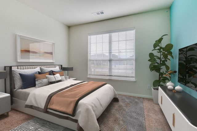 bedroom featuring carpet, visible vents, and baseboards