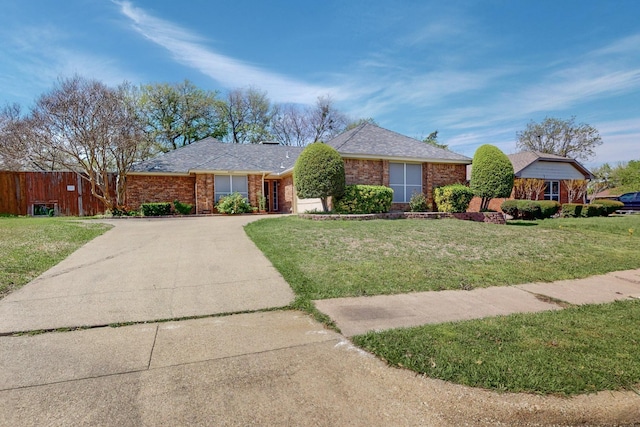 ranch-style house with a front yard