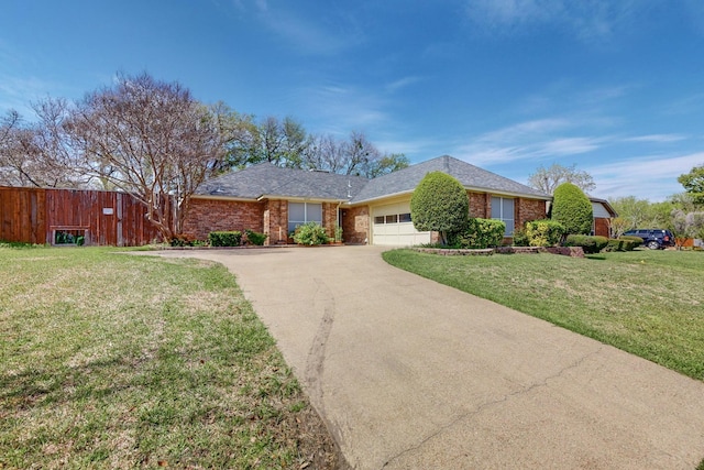 single story home with a garage and a front yard