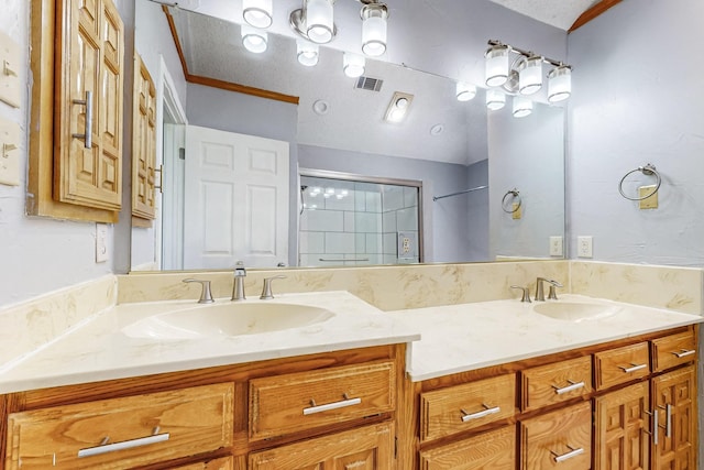 bathroom with vanity, walk in shower, and ornamental molding