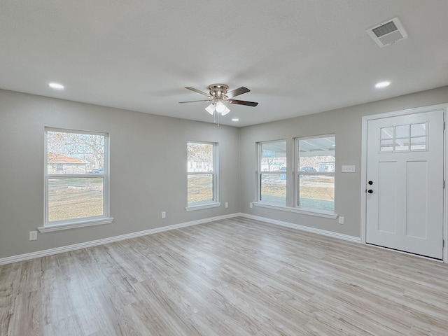 entrance foyer featuring light hardwood / wood-style floors and ceiling fan