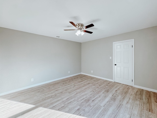 unfurnished room featuring ceiling fan and light hardwood / wood-style flooring