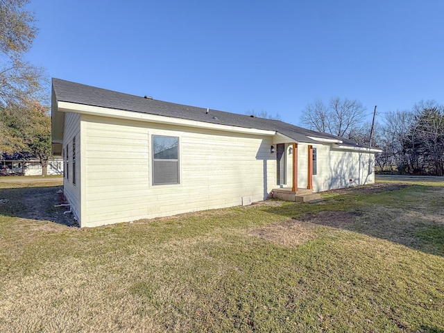 exterior space with a yard