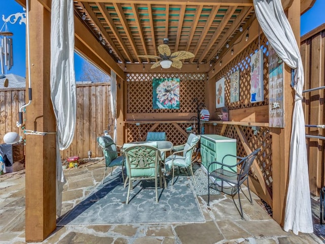 view of patio with ceiling fan