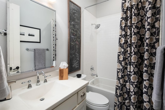 full bathroom featuring shower / bath combo, toilet, and vanity