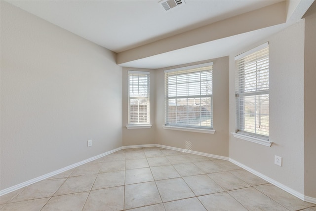 view of tiled spare room