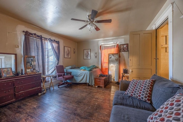 bedroom featuring dark wood-type flooring and ceiling fan