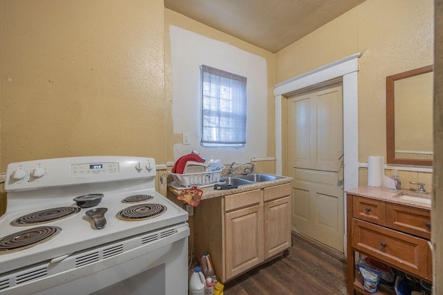 kitchen with white range with electric cooktop, sink, and dark hardwood / wood-style floors