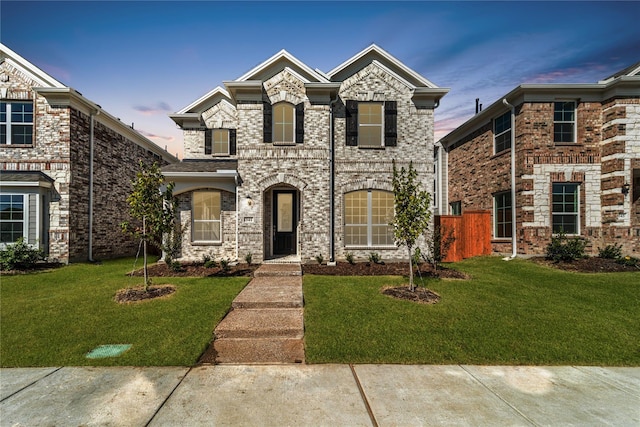 view of front facade with a lawn