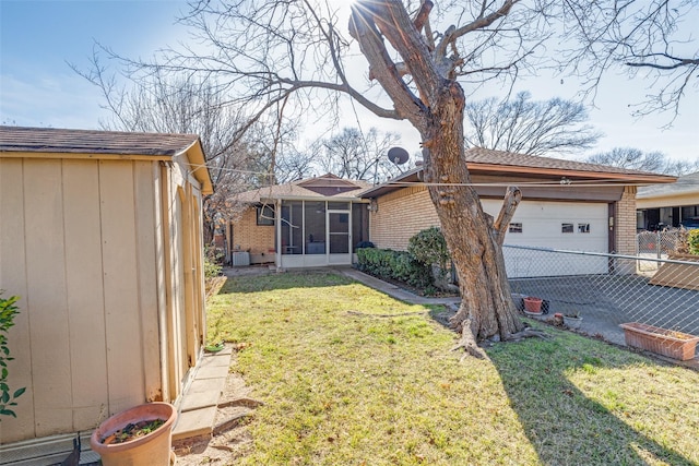 view of yard with a sunroom