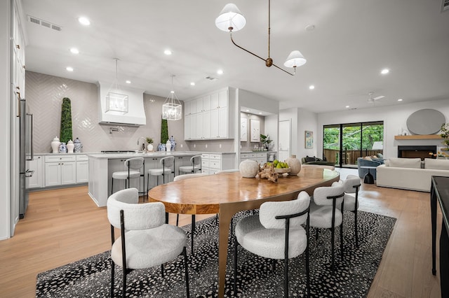 dining area featuring light hardwood / wood-style floors