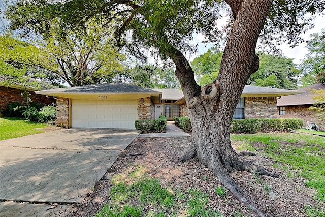 ranch-style house with a garage