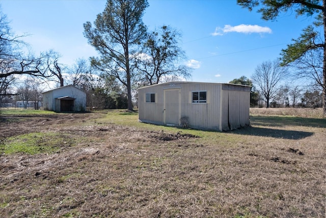 exterior space featuring an outbuilding