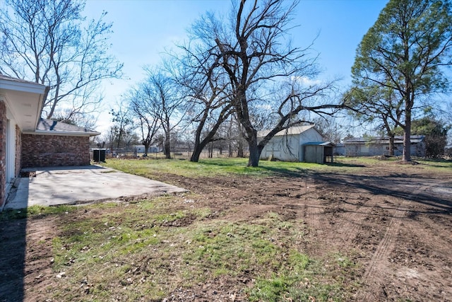 view of yard with a patio area