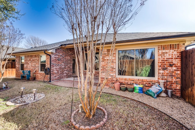 back of property with a patio area