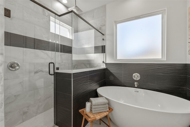 bathroom with independent shower and bath