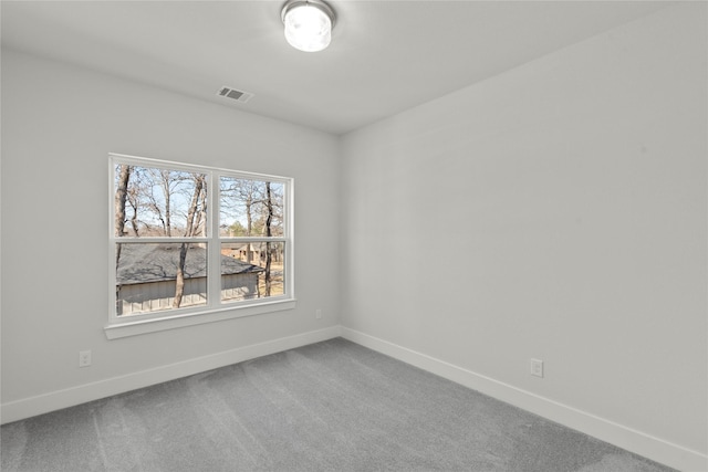 view of carpeted spare room