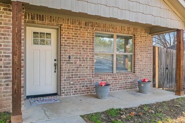 property entrance with a patio