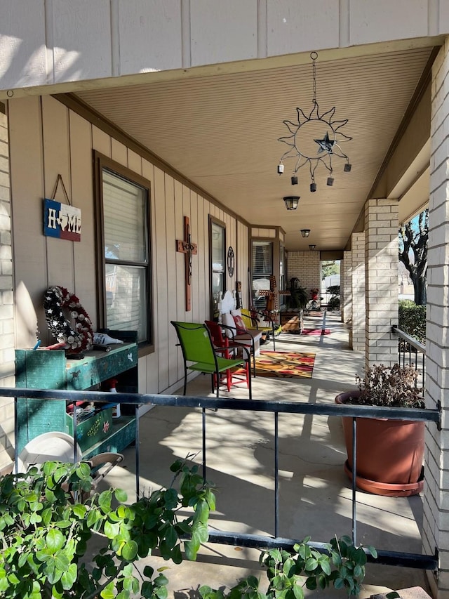 view of patio featuring a porch