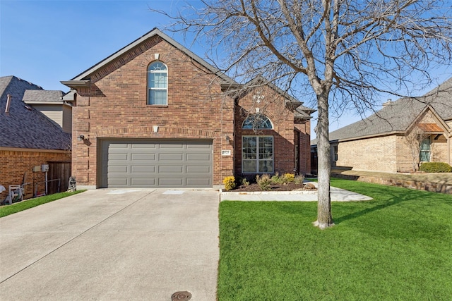 front facade featuring a garage and a front lawn