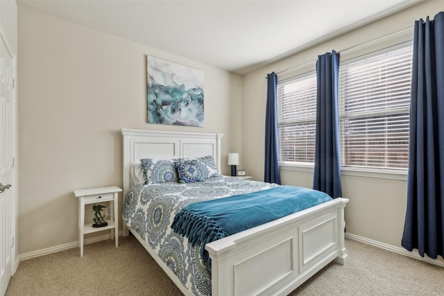 bedroom with light carpet