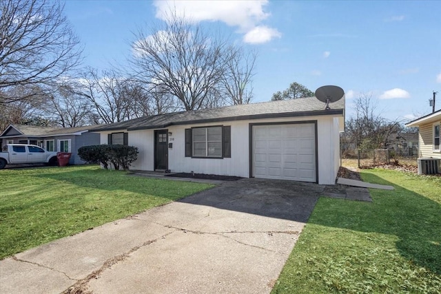 ranch-style home featuring central AC unit, a garage, and a front yard