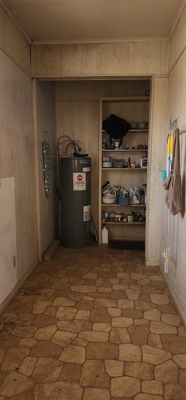 utility room with electric water heater