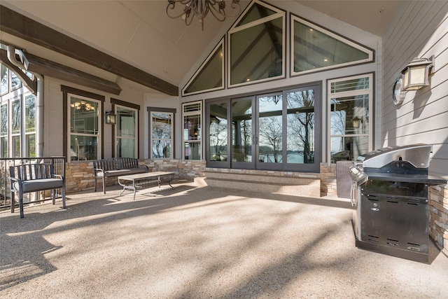 view of patio with a grill